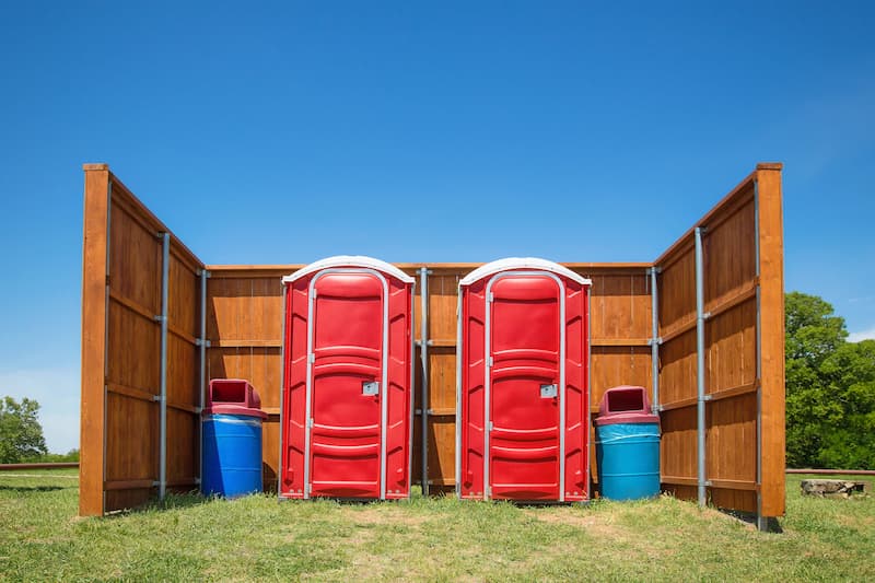 Short-term porta potty units staged for delivery in Ganado, Arizona